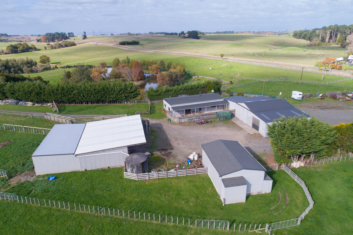 Attractive, Well Fenced, Watered + Massive Sheds!